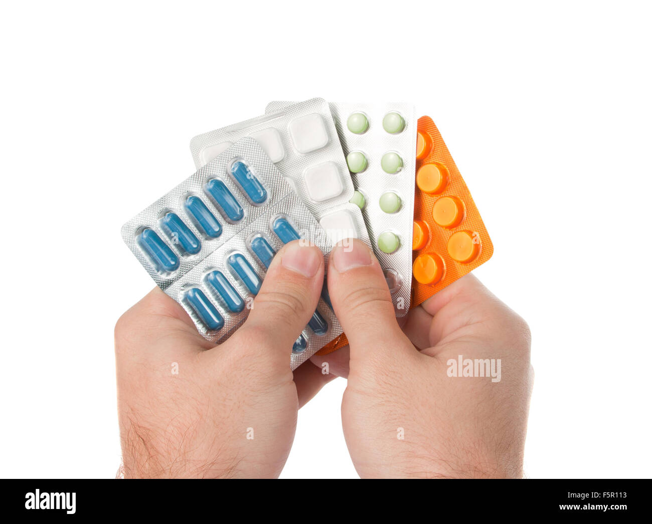 Glücksspiel Medikamente in der Handfläche. Isoliert auf weiss Stockfoto