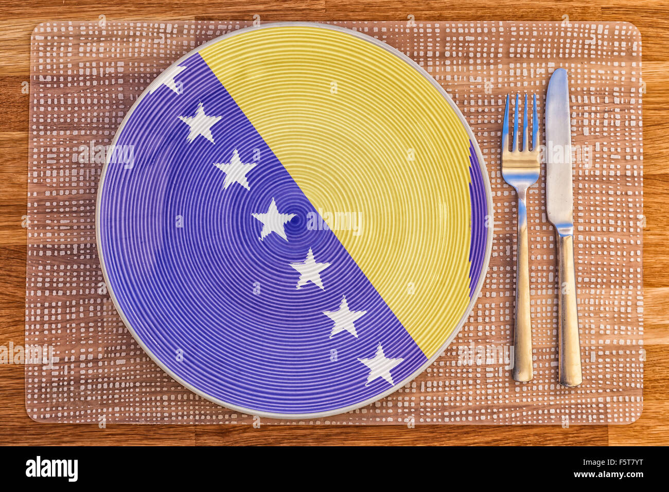 Teller mit der Flagge von Bosnien und Herzegowina auf es für Ihre internationale Speisen und Getränke-Konzepte. Stockfoto