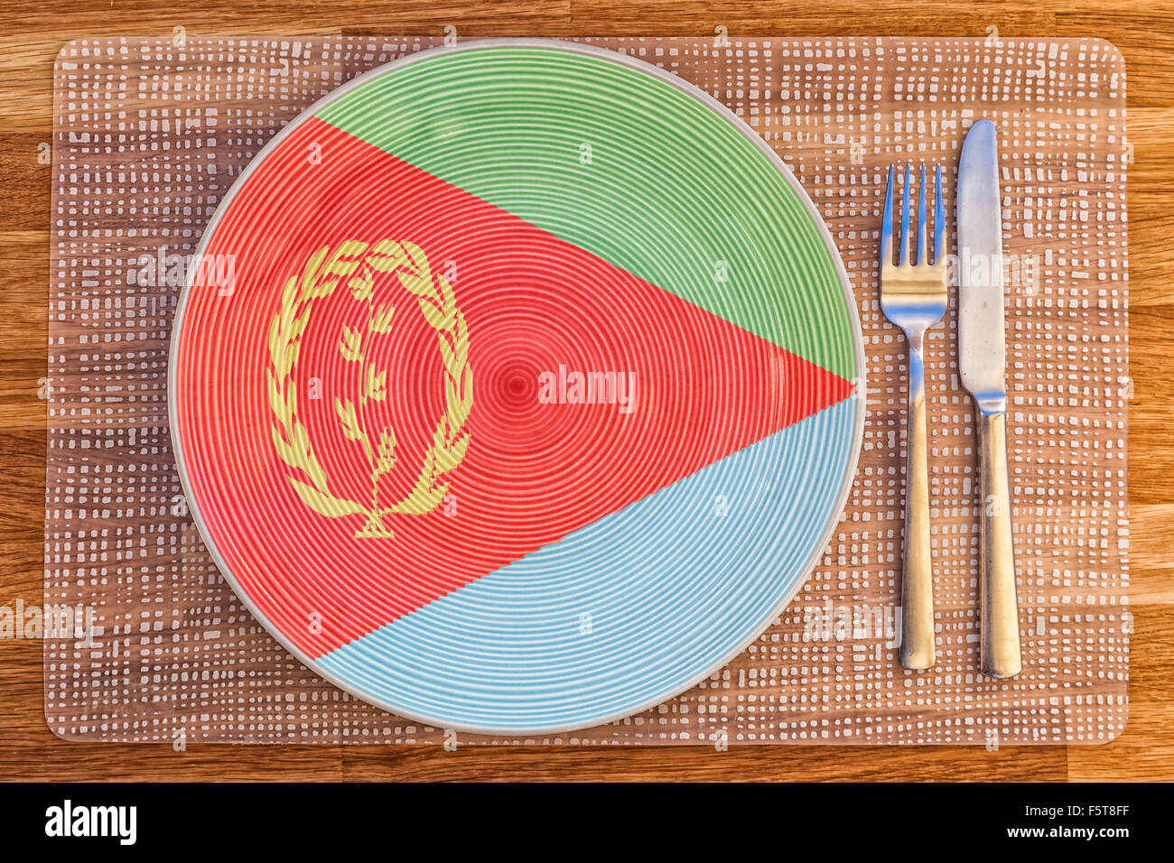 Teller mit der Flagge von Eritrea drauf für Ihre internationale Speisen und Getränke-Konzepte. Stockfoto