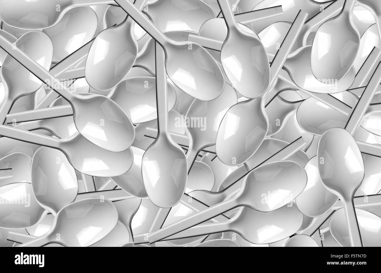 Viele weiße Plastik Löffel. Verwendung für Hintergrund oder Textur Stockfoto