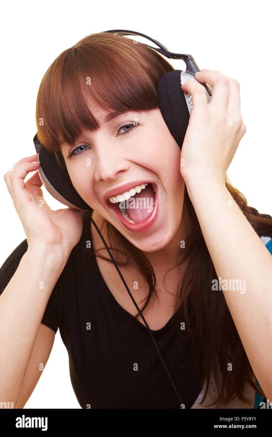 Glückliche Mädchen Musikhören mit Kopfhörer Stockfoto