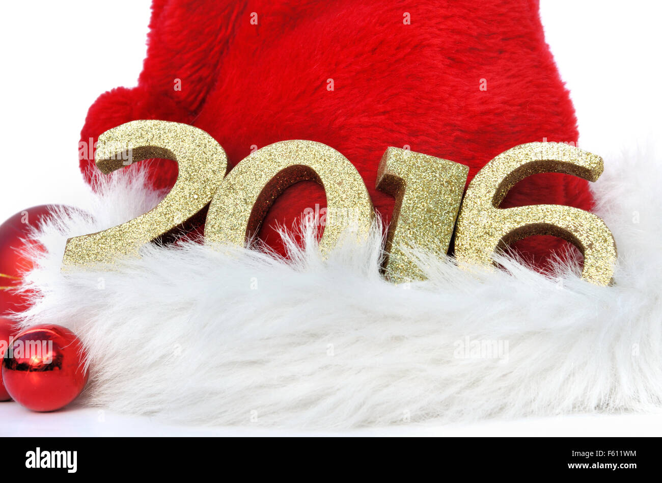 2016 goldenen Figuren auf Klaus Weihnachtsmütze Stockfoto