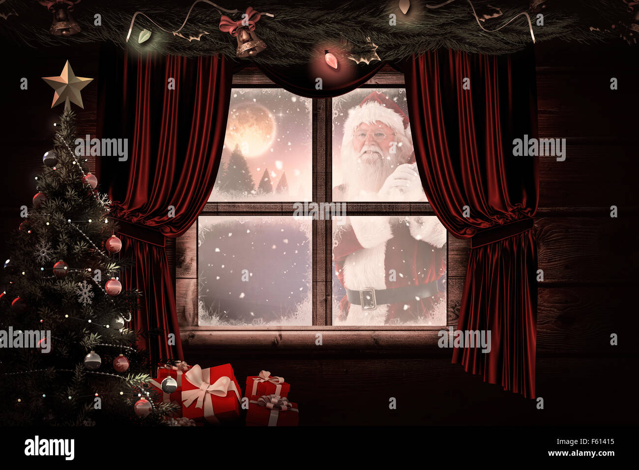 Zusammengesetztes Bild von Santa trägt seine rote Tasche und lächelt Stockfoto