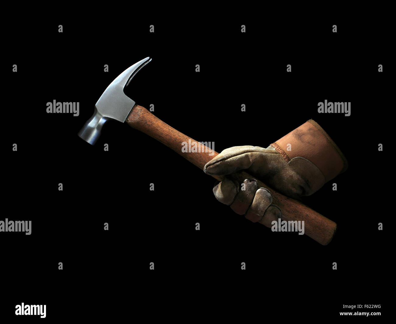 Studioaufnahme eines Handschuhs, mit einem hammer Stockfoto