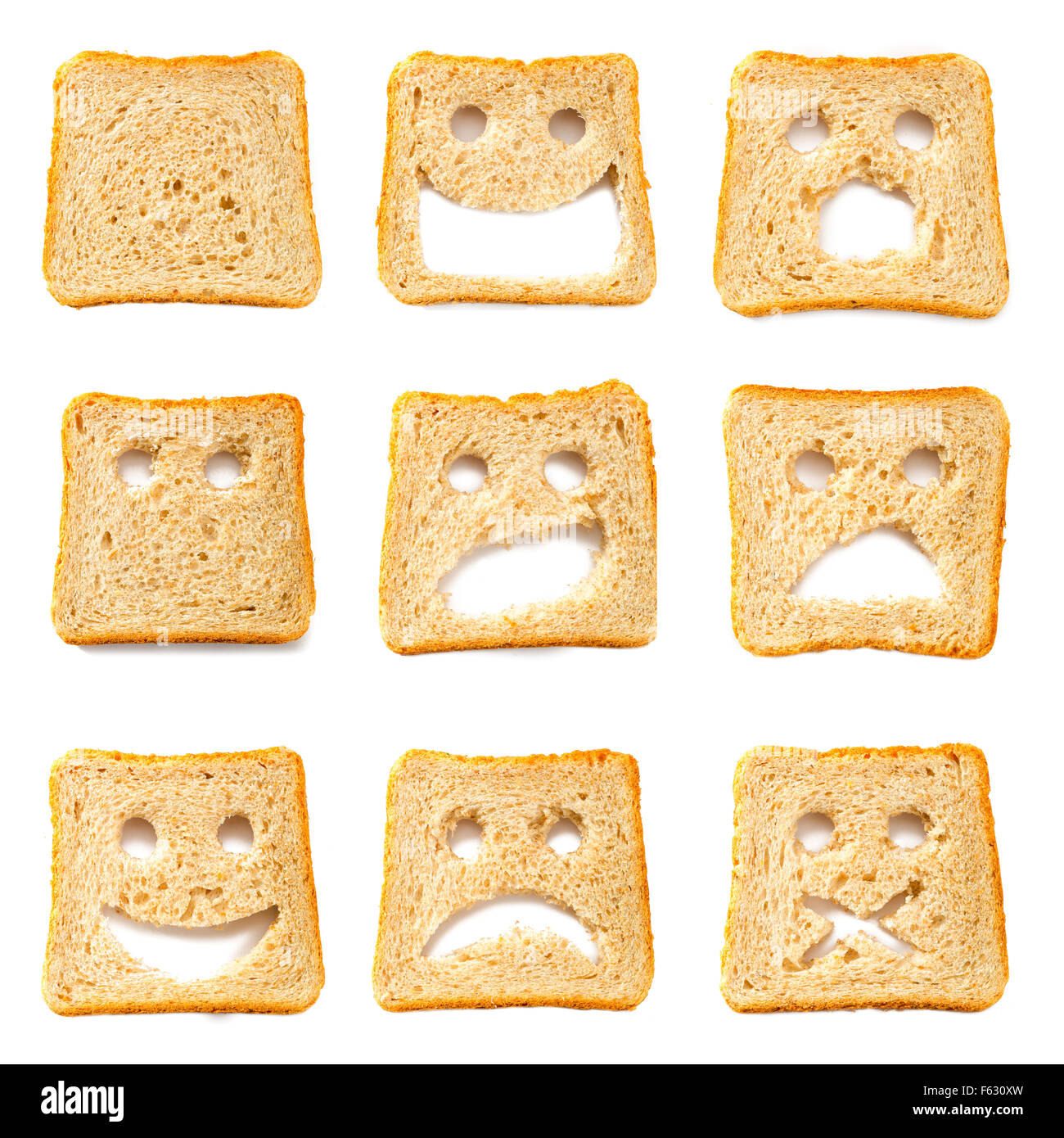 Geröstete Brotscheiben zum Frühstück mit lustigen Gesichtern Stockfoto