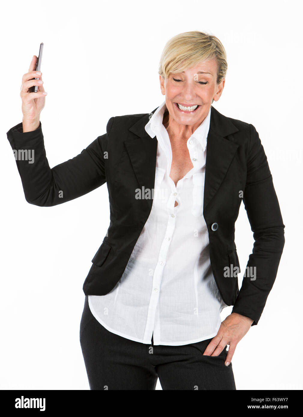 mittleren Alters Manager Frau mit einem Mobiltelefon Stockfoto