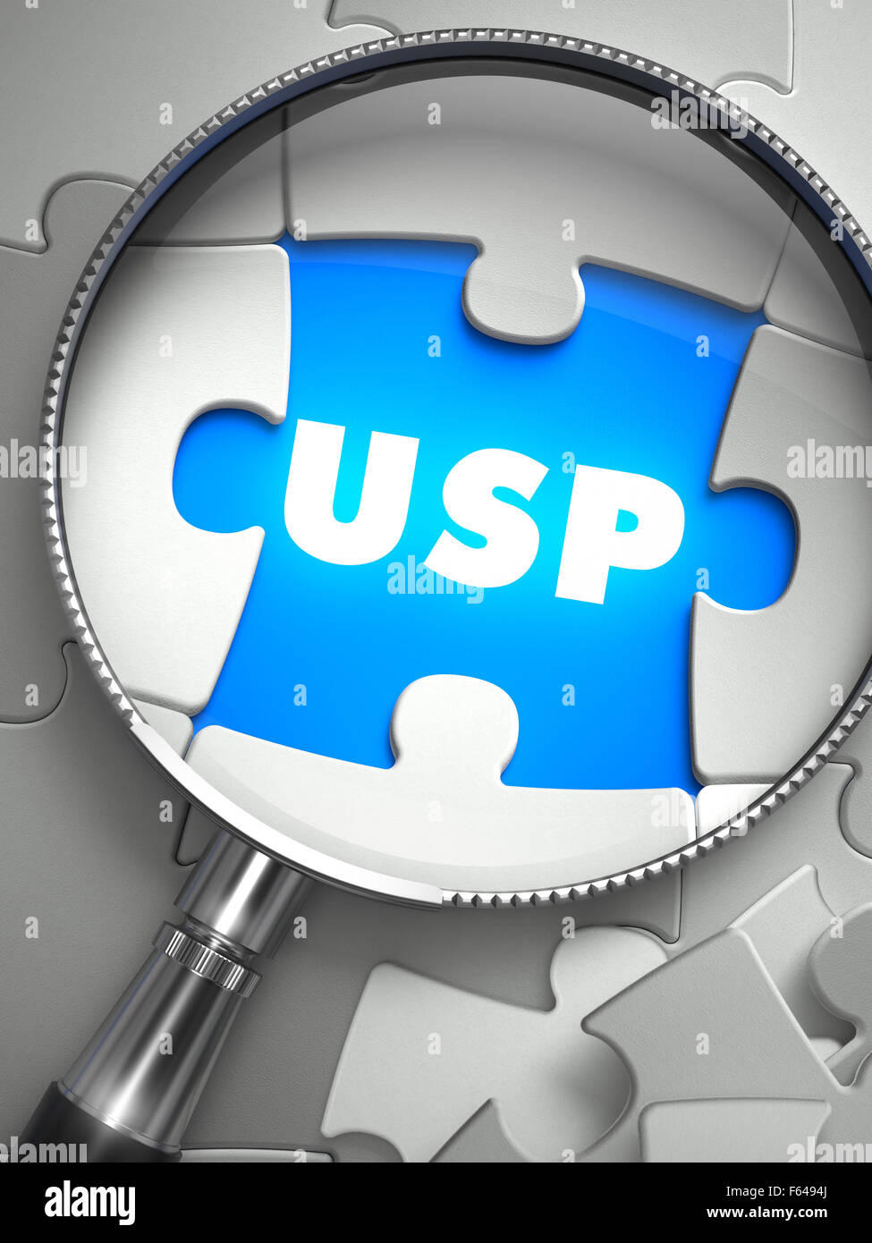 USP - Unique Selling Point - Wort an der Stelle der fehlenden Puzzleteil durch Lupe. Selektiven Fokus. Stockfoto