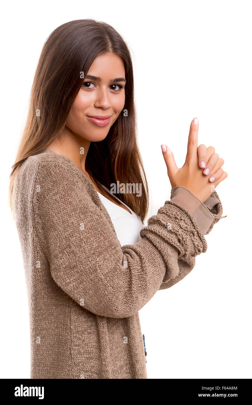 Junge Frau macht eine Waffe mit ihren Händen - Business-Konzept Stockfoto