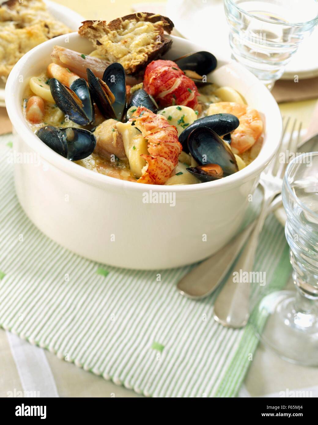 Cotriade mit Calvados Stockfoto