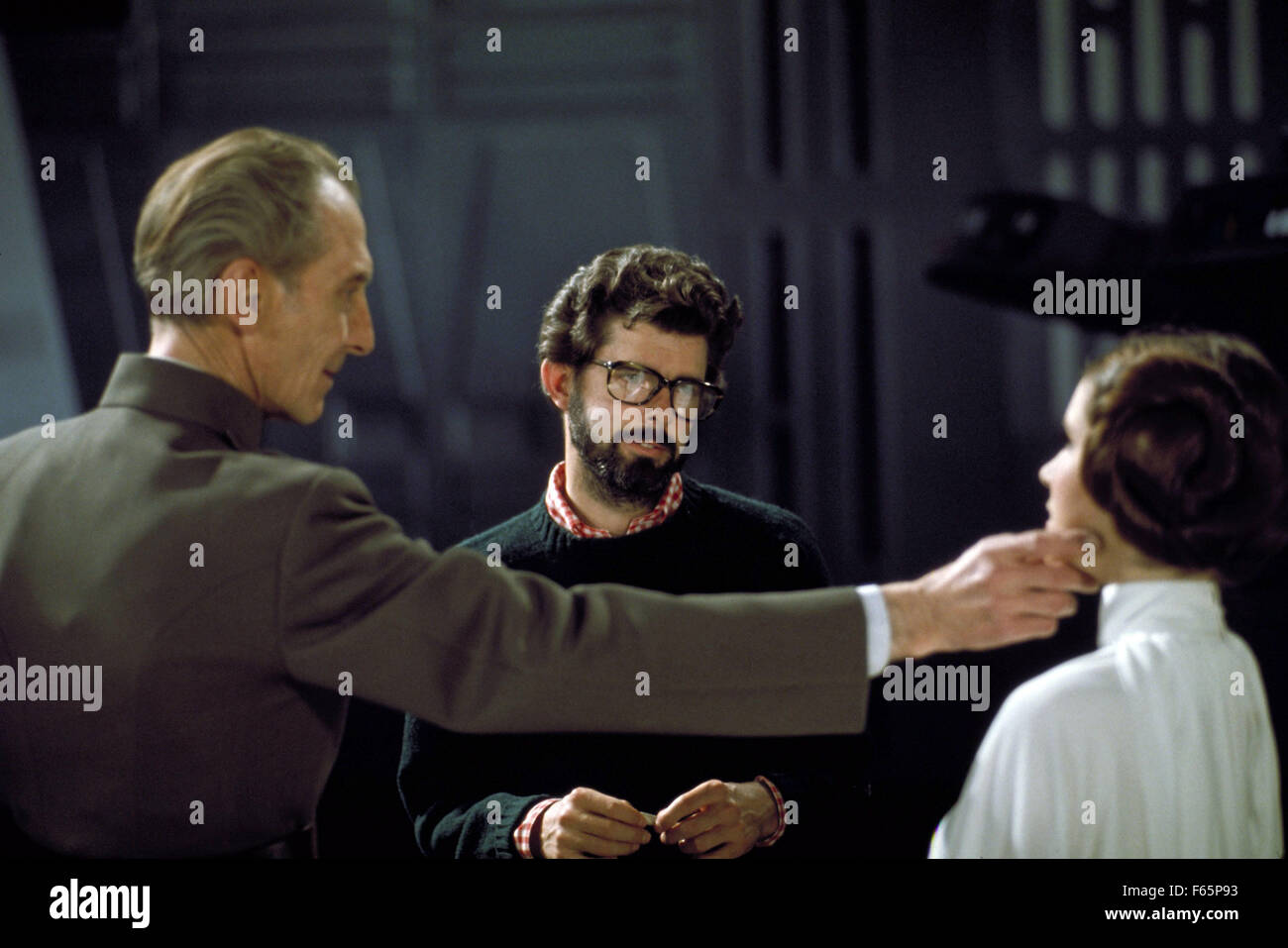 Star Wars: Episode IV - A New Hope Jahr: 1977 USA Regie: George Lucas Peter Cushing, George Lucas, Carrie Fisher Foto de Tournage Stockfoto