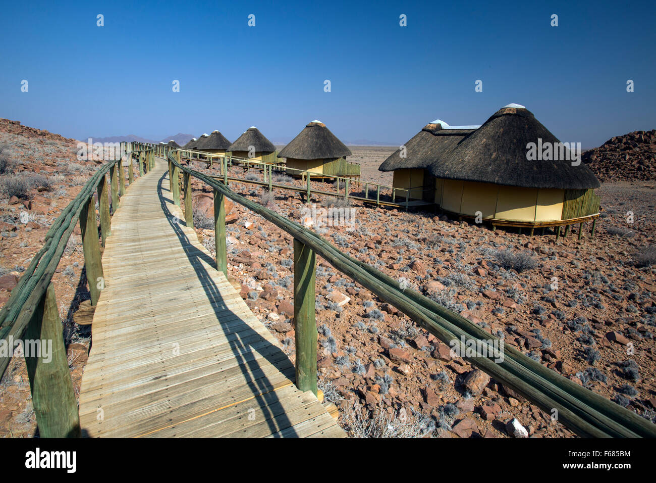 Sossus Dune Lodge strohgedeckte Hütten in Sossusvlei, Namibia, Afrika Stockfoto