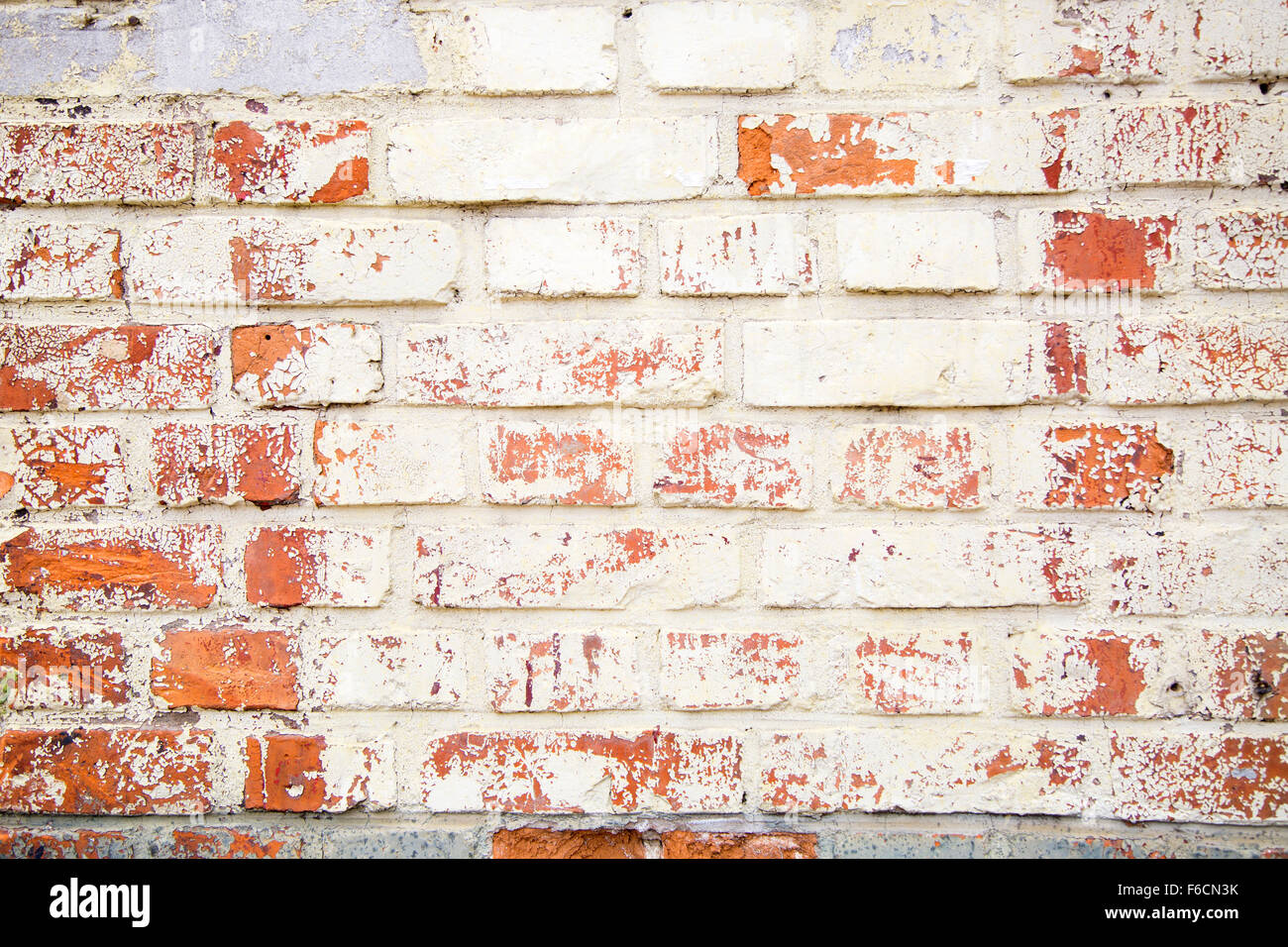 Hintergrund der alten Vintage verschmutzte Ziegelwand mit peeling Putz, Textur Stockfoto