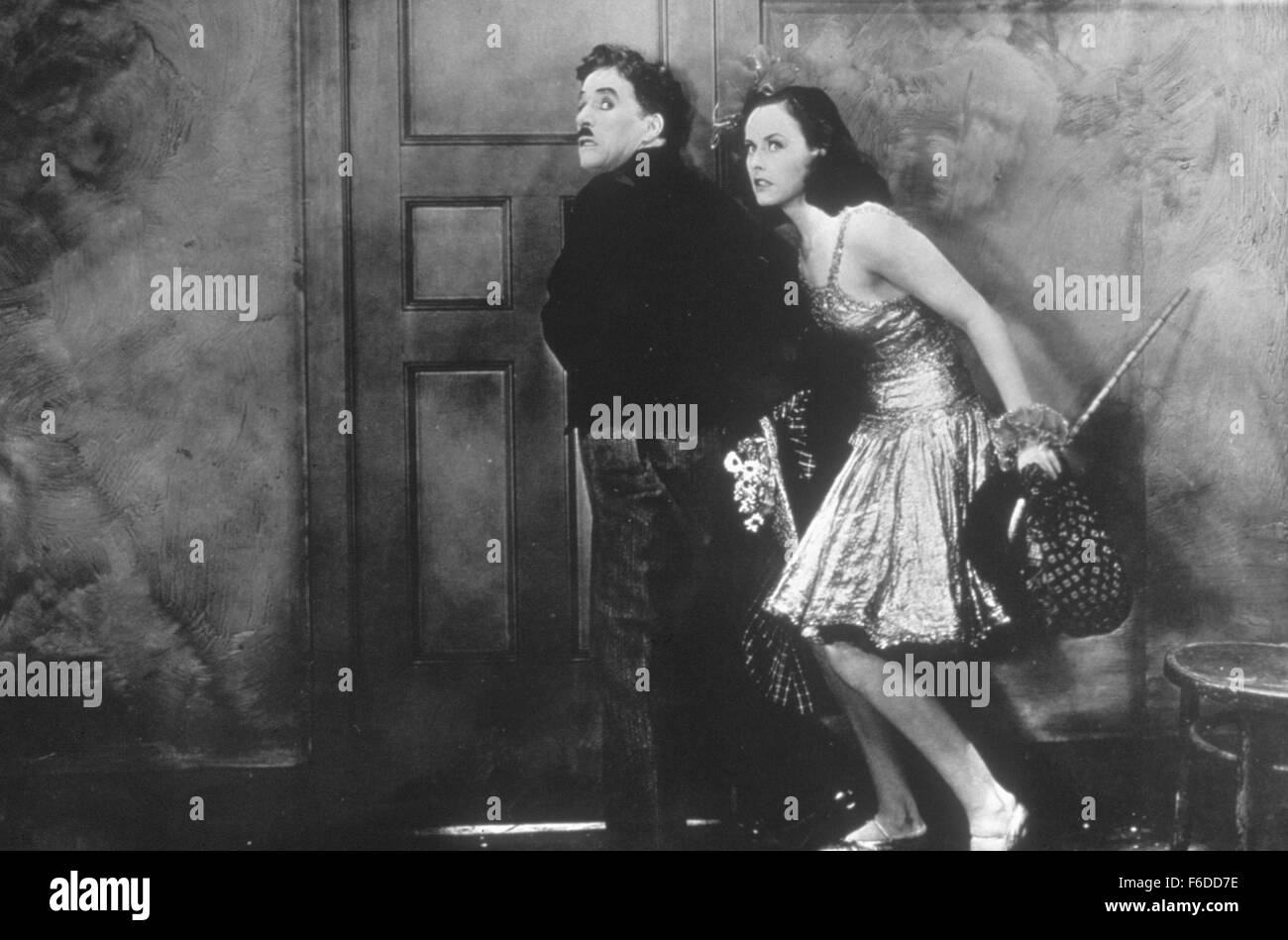 Datum der Freigabe: 25. Februar 1936. FILMTITEL: Neuzeit. STUDIO: Charles Chaplin-Produktionen. PLOT: Chaplins letzter "stiller" Film, voller Sound-Effekte, wurde gemacht, als alle anderen Tonfilm machte. Charlie stellt sich gegen die moderne Gesellschaft das Maschinenzeitalter (Credit Bild: Entertainment Bilder) Stockfoto