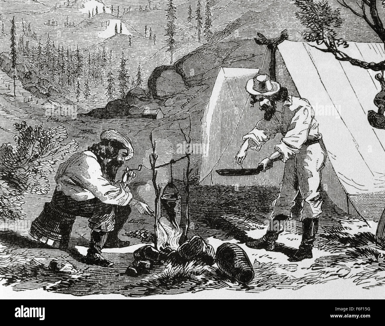 USA. Gold Rush. des 19. Jahrhunderts. Goldsucher Kochen im Lager bei Nacht. Gravur auf "Harpers Weekly", 1857. Stockfoto