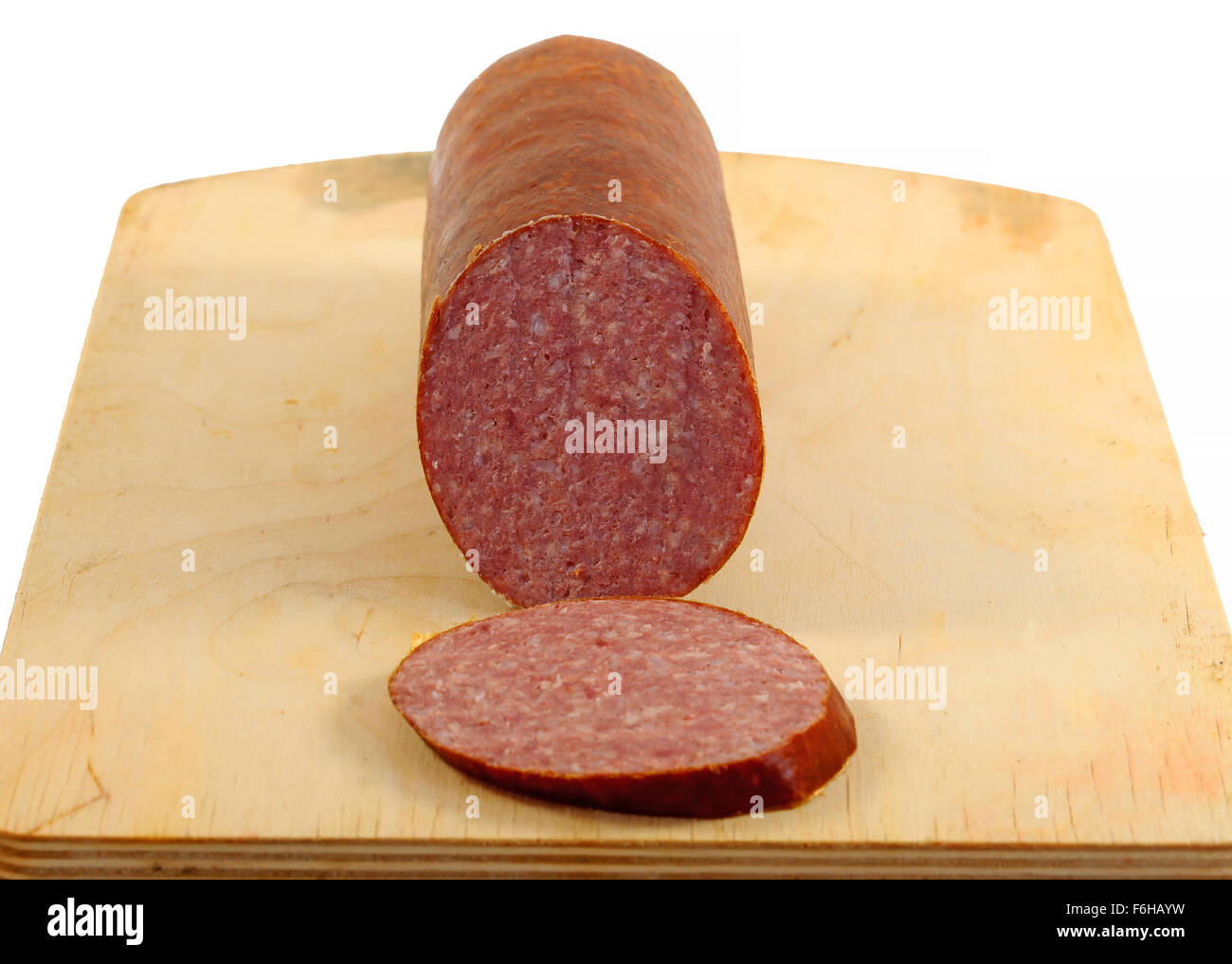 Leckere Wurst Fleisch auf einem Holzbrett fotografiert hautnah Stockfoto