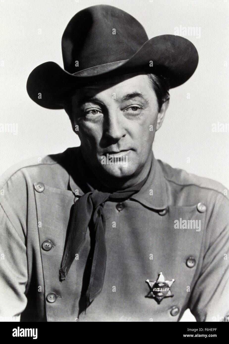 1967, Filmtitel: EL DORADO, Regie: HOWARD HAWKS, Studio: PARAMOUNT, abgebildet: Kleidung, ROBERT MITCHUM, WESTERN, COWBOY-Hut, Halstuch, SHERIFF, GRÜBCHEN, Kinn, UNIFORM. (Bild Kredit: SNAP) Stockfoto