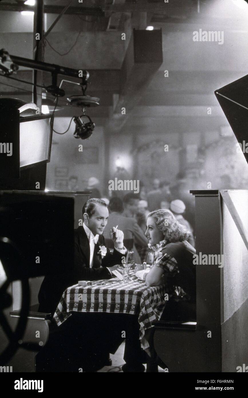 Filmtitel 1933: DANCING LADY, Regie: ROBERT Z LEONARD, Studio: MGM, im Bild: hinter den Kulissen, JOAN CRAWFORD, ROBERT Z LEONARD, FRANCHOT TONE, STUDIO, PORTRAIT. (Bild Kredit: SNAP) Stockfoto