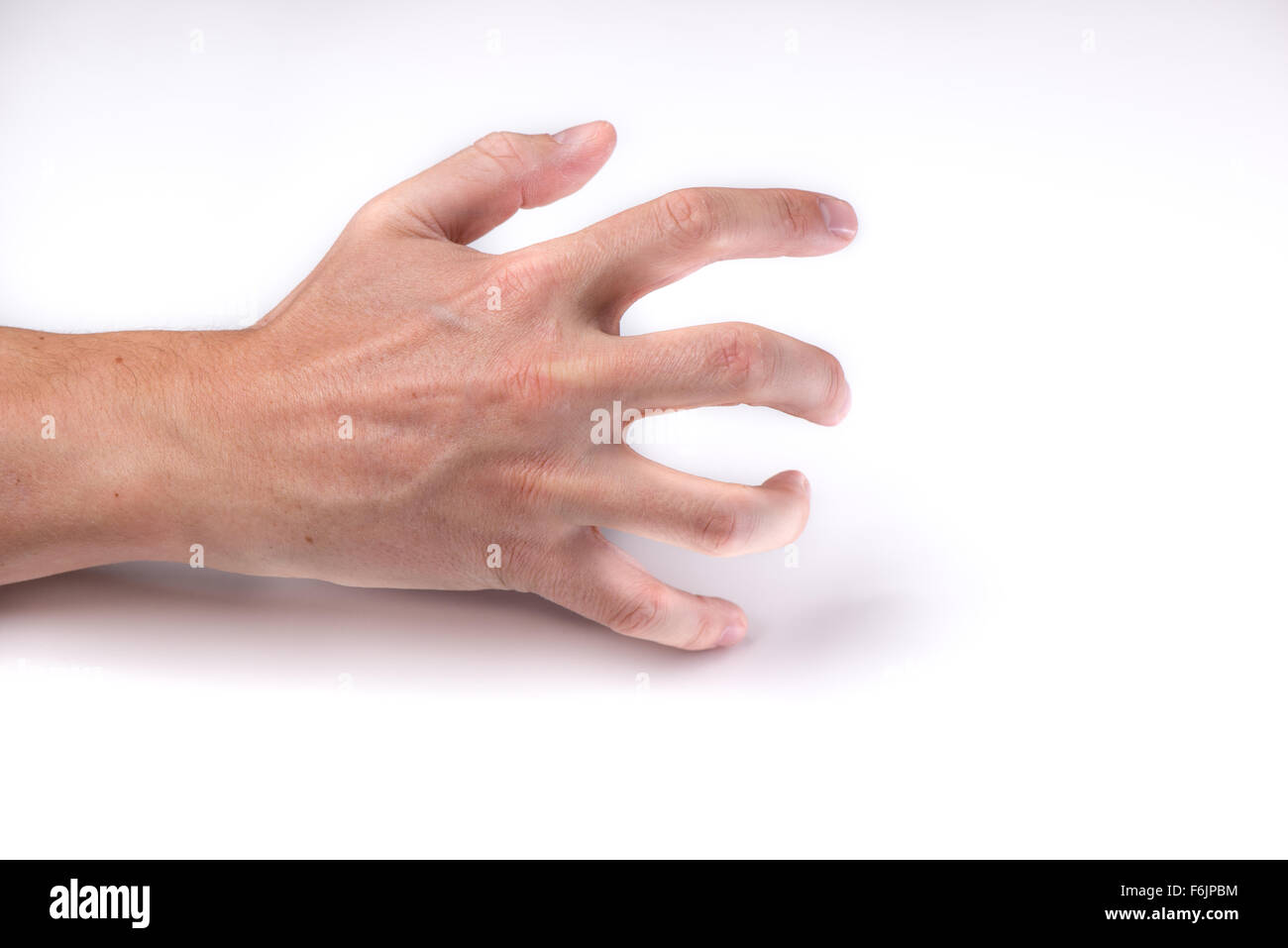 Eine Hand mit offenen Fingern greifen leere auf weißem Hintergrund Stockfoto