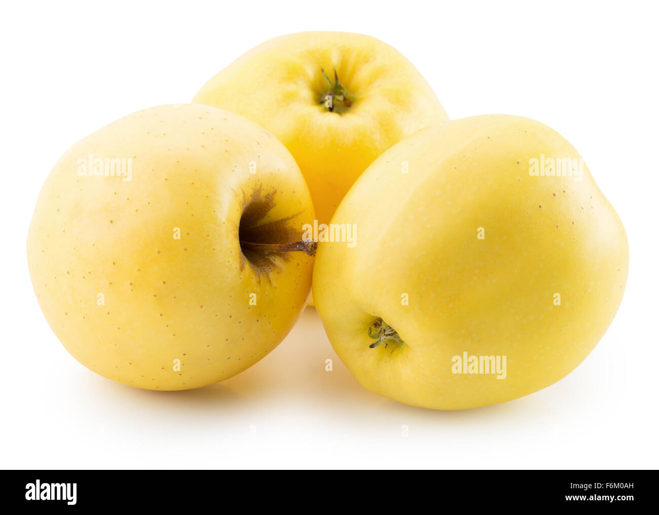 gelben Äpfeln auf dem weißen Hintergrund isoliert. Stockfoto