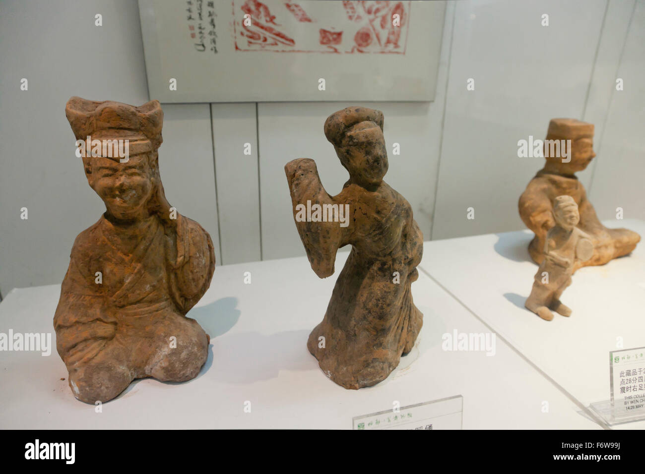 Keramik Figuren Darstellung Köche aus der Östlichen Han-Zeit (25-220AD) angezeigt in Chengdu Museum der Sichuan-Küche. Stockfoto