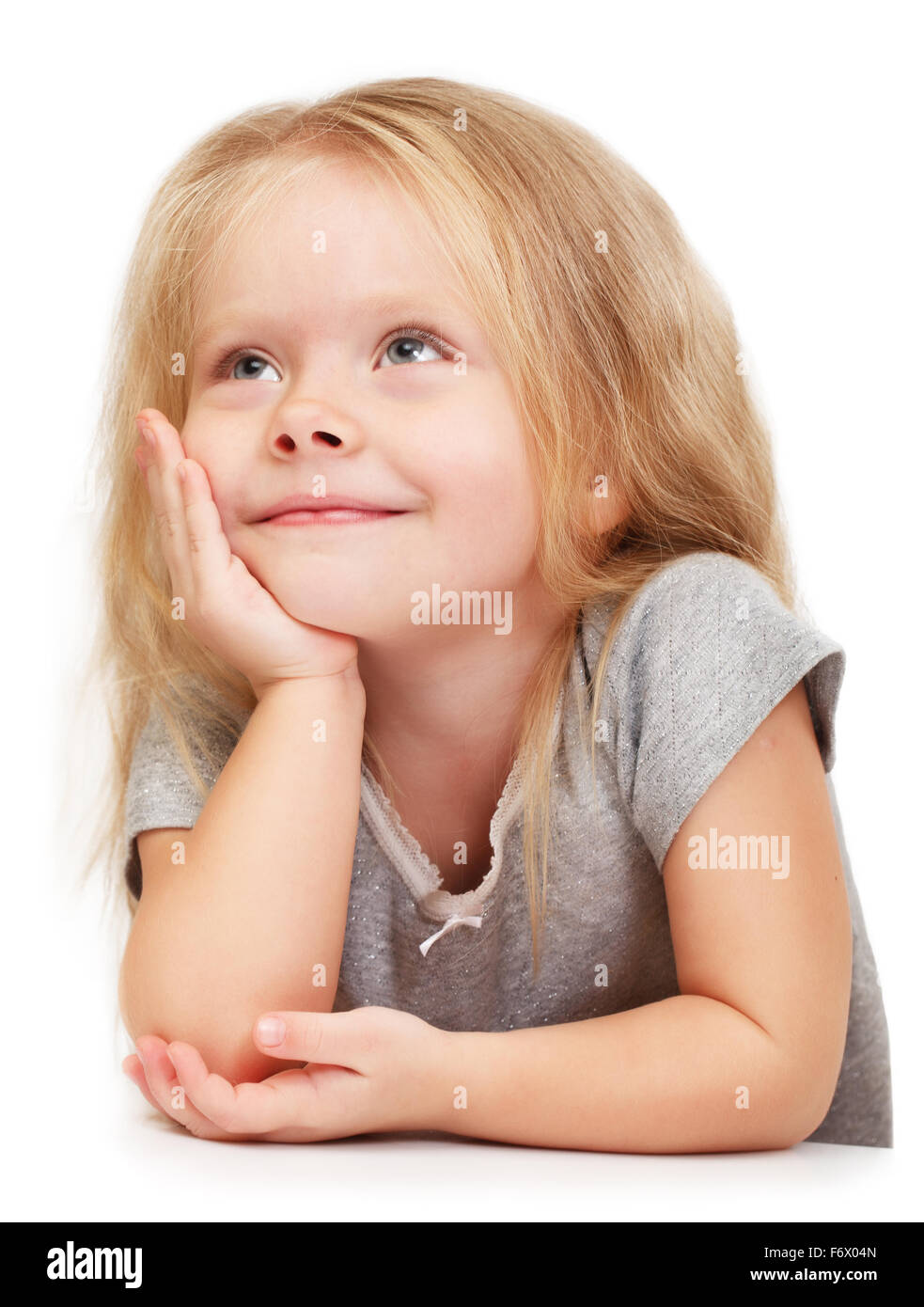 Kleines Mädchen in Gedanken versunken. Isoliert auf weißem Hintergrund Stockfoto