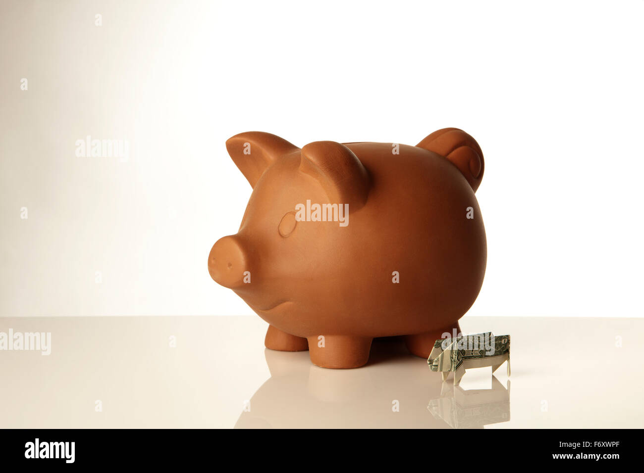 Sparschwein mit einer ein-Dollar-note Stockfoto