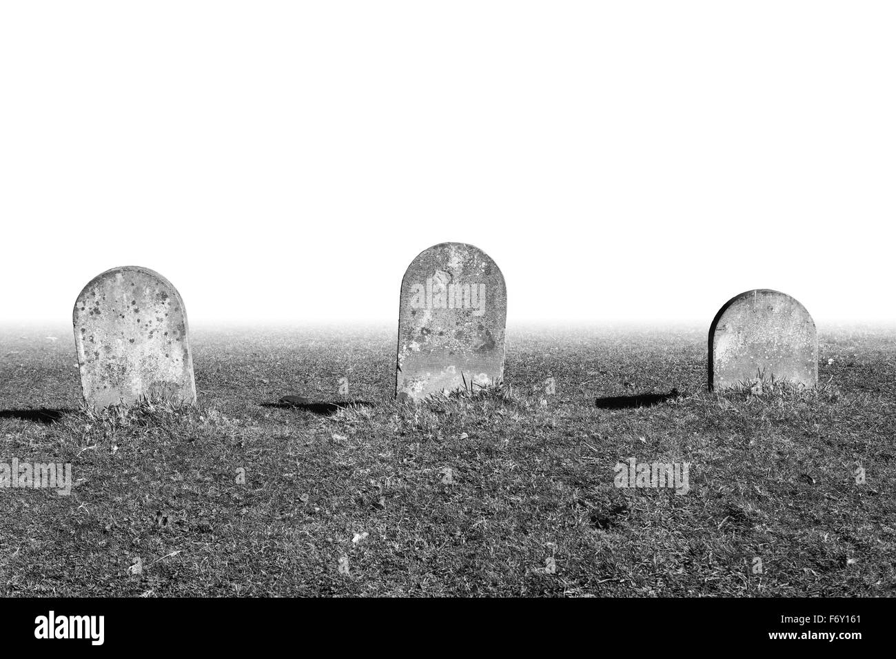 drei Grabstein in einer Linie Ausschneiden Stockfoto