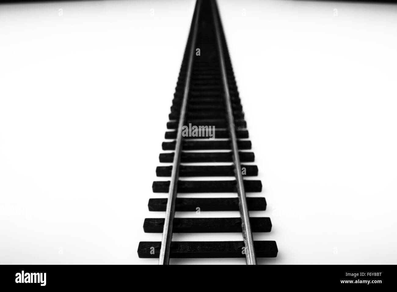 Schuss von einem Spielzeug Eisenbahn Linie gehen in die Ferne hautnah Stockfoto