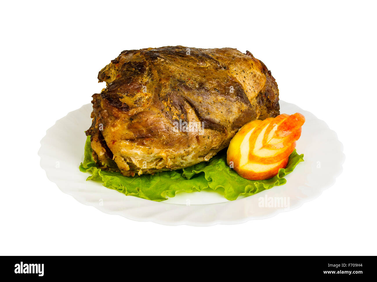 Schweinefleisch vom Wildschwein auf dem Teller, isoliert auf weißem Hintergrund Stockfoto