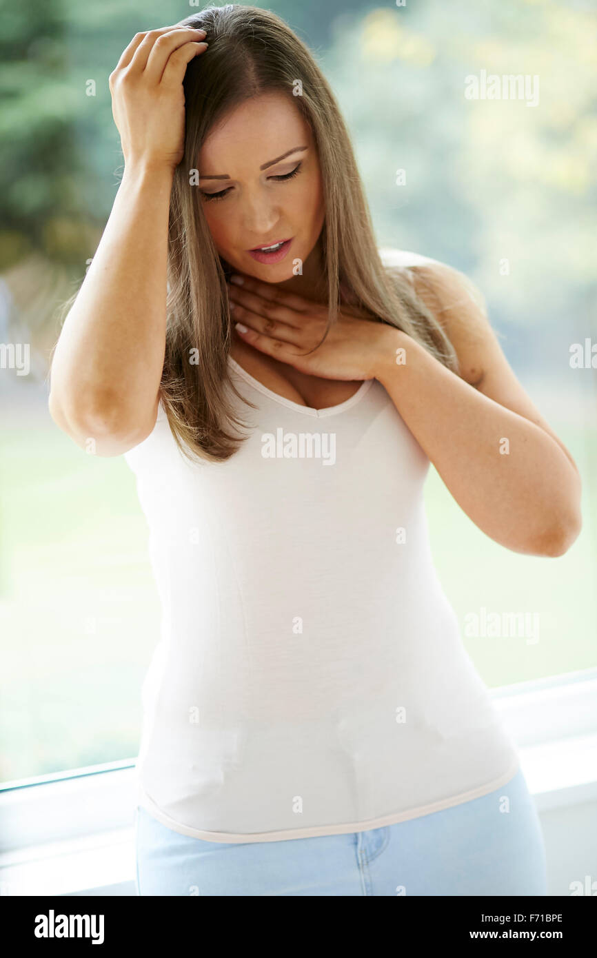 Frau, die eine Panikattacke Stockfoto