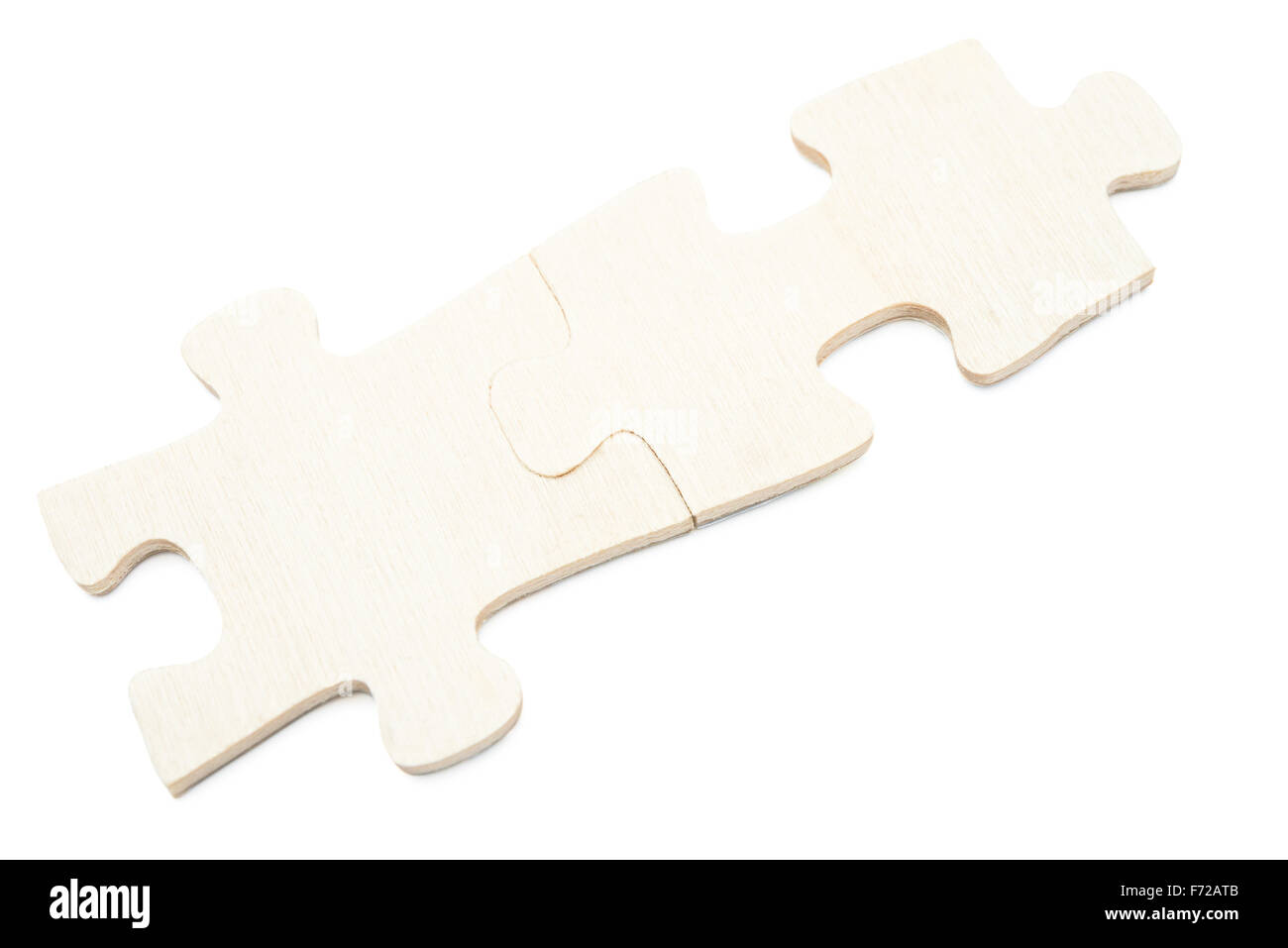 zwei Teile des Puzzles auf weiß mit Beschneidungspfad Stockfoto