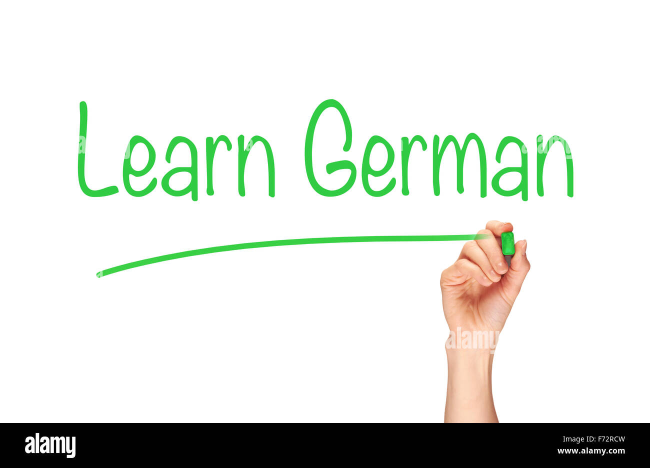 Die Hand einer Frau das Wort Deutsch lernen, auf eine klare Bildschirm zu schreiben. Stockfoto