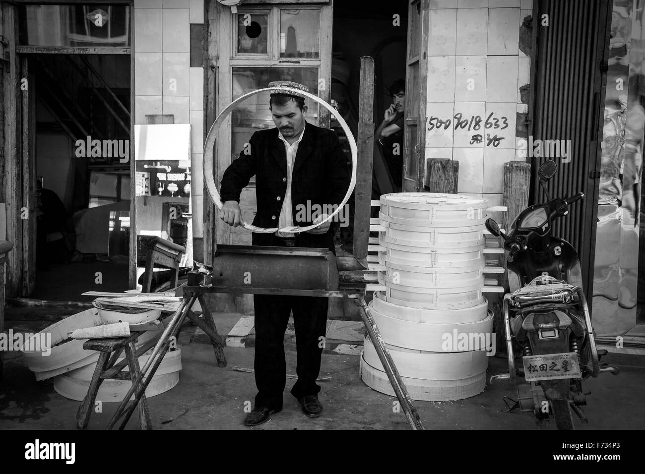 Dampf Bambuskorb Hersteller, Altstadt von Kashgar, Uigurischen Autonomen Gebiet Xinjiang, China. Stockfoto