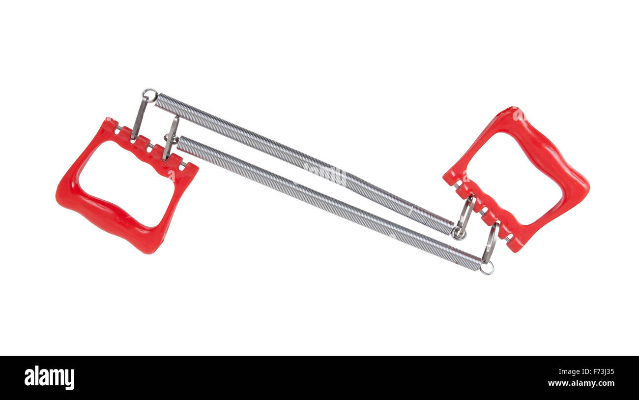 Brust-Expander mit roter Griff isoliert auf weiss Stockfoto