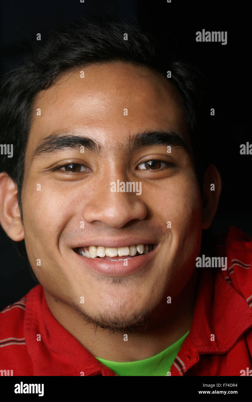 Lächelnder malaiischen Mann Stockfoto