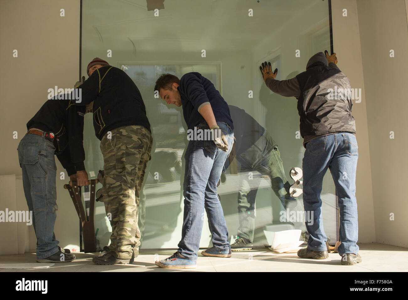 Bauarbeiter in ein neues Haus im Bau in Nord-Italien, Stockfoto