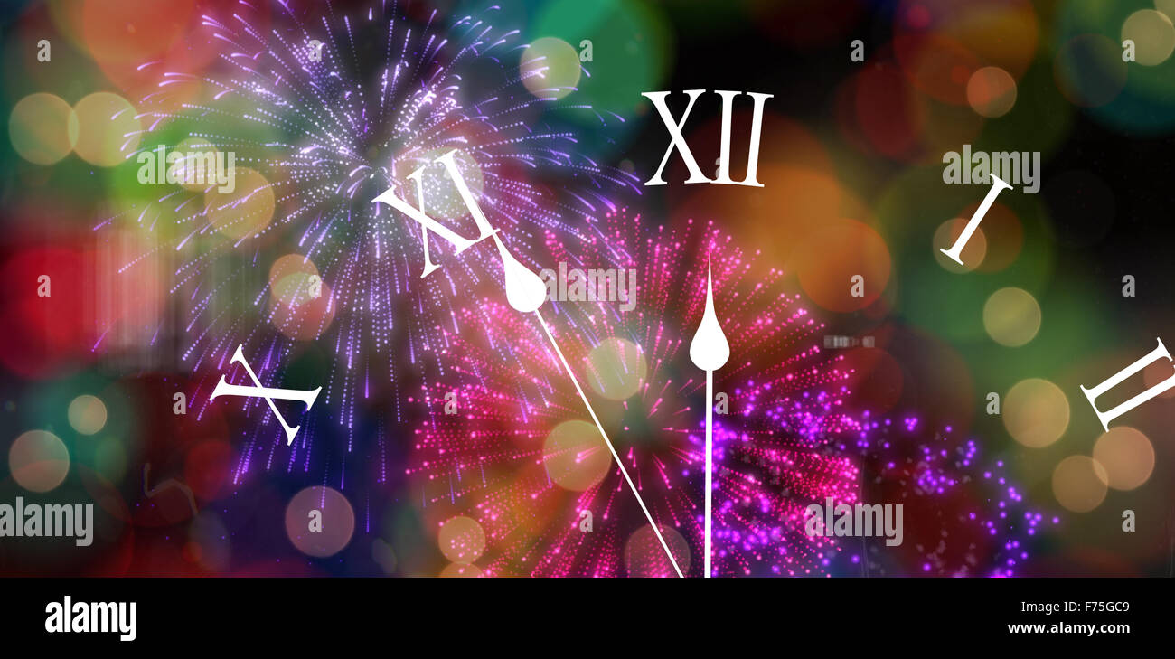 Zusammengesetztes Bild der Uhr Countdown bis Mitternacht Stockfoto