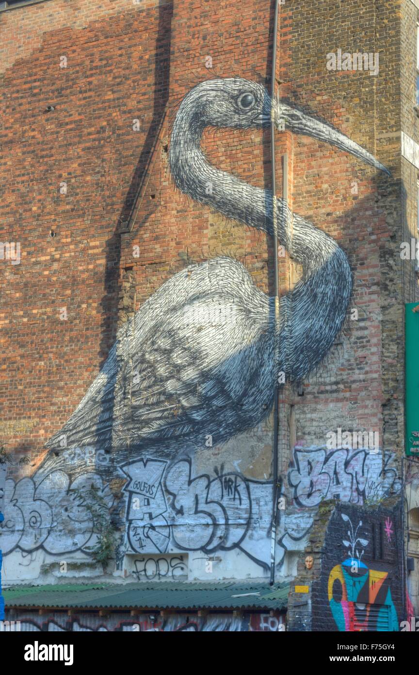 Der Kran Street Art von Roa.  Brick Lane Stockfoto