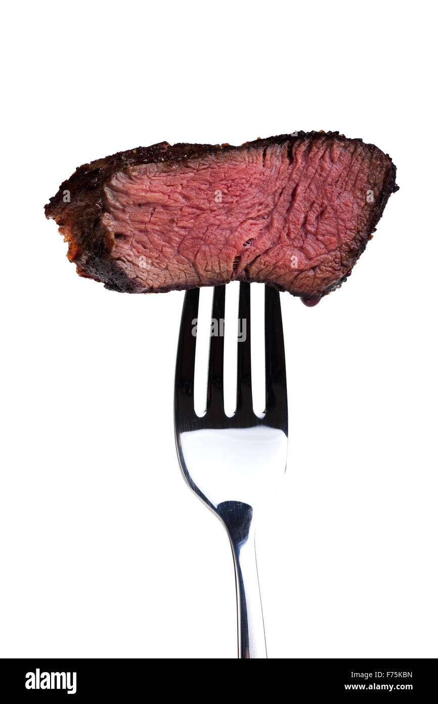 Stück ein gegrilltes Steak auf einer Gabel Stockfoto