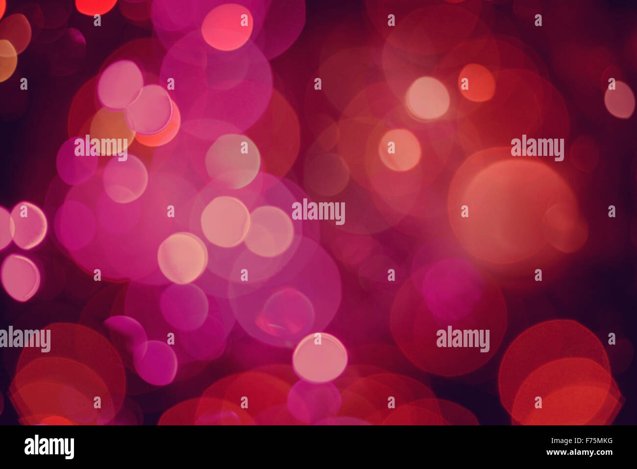 Defokussierten Unschärfe Lichter Hintergrund, Closeup in roter Farbe mit Bokeh-Effekt. Ideal für Urlaub Grußkarte, Event oder web Stockfoto