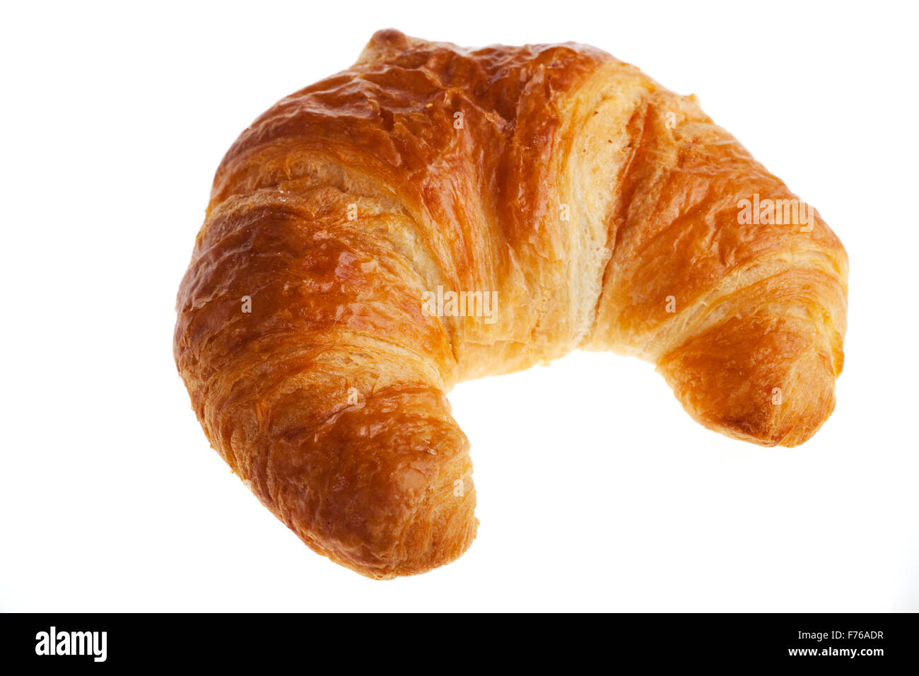 Croissant und eine Tasse Kaffee Stockfoto