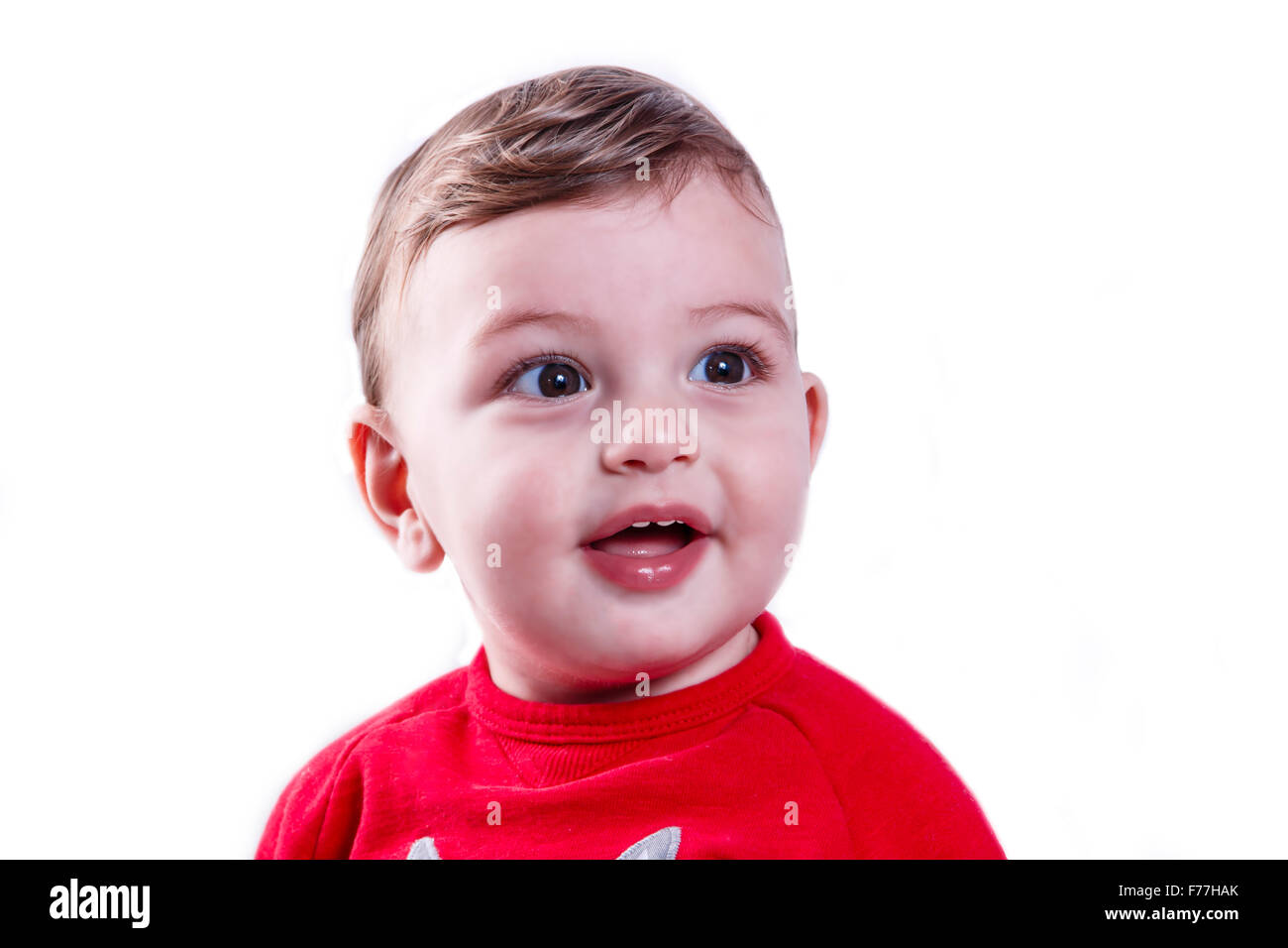 wenig fröhlicher Junge ein Jahr alt auf weißem Hintergrund Stockfoto