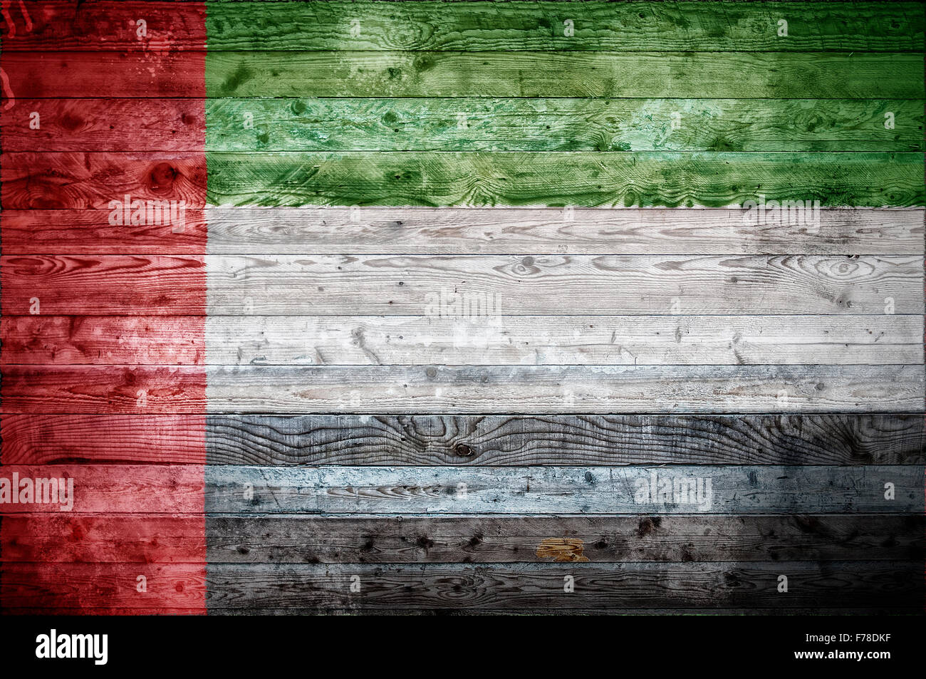 Ein bandtypischen Hintergrundbild der Flagge der Vereinigten Arabischen Emirate auf Holzbrettern einer Wand oder Boden. Stockfoto