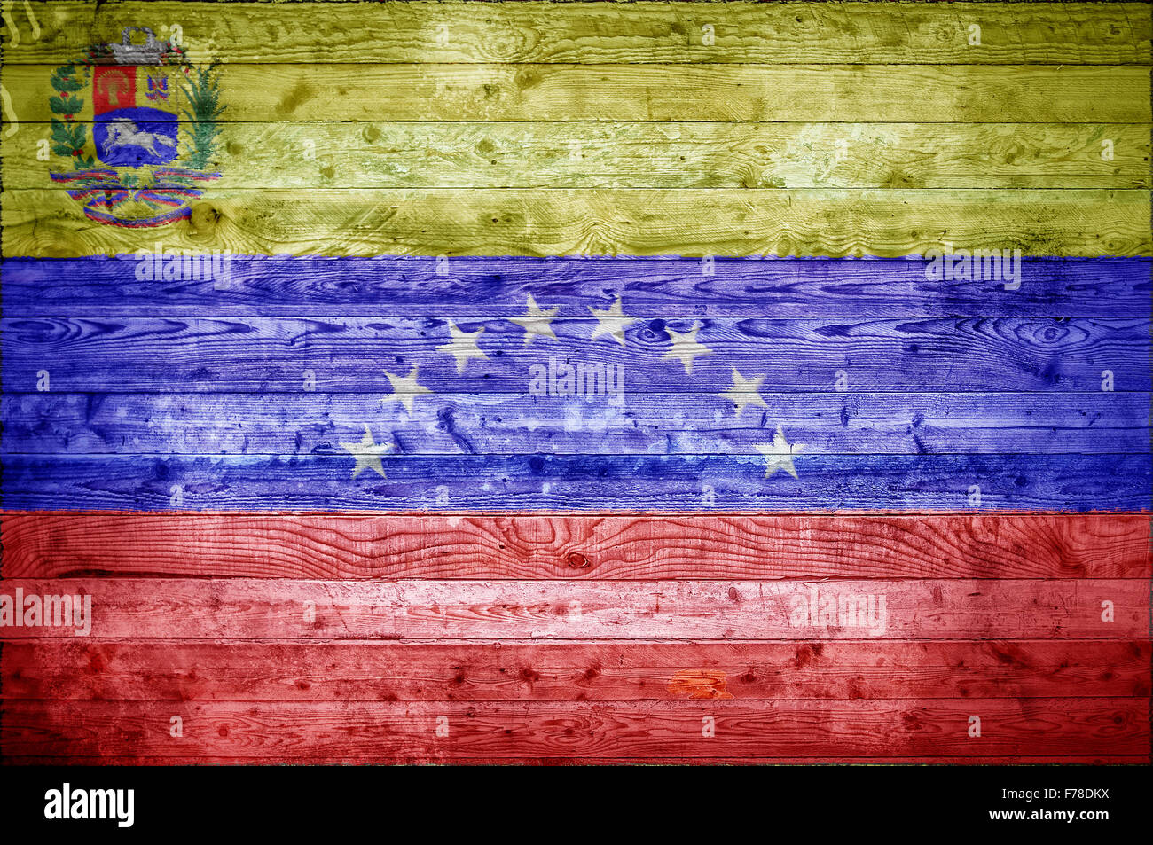 Ein bandtypischen Hintergrundbild der Flagge Venezuelas auf Holzbrettern einer Wand oder Boden. Stockfoto