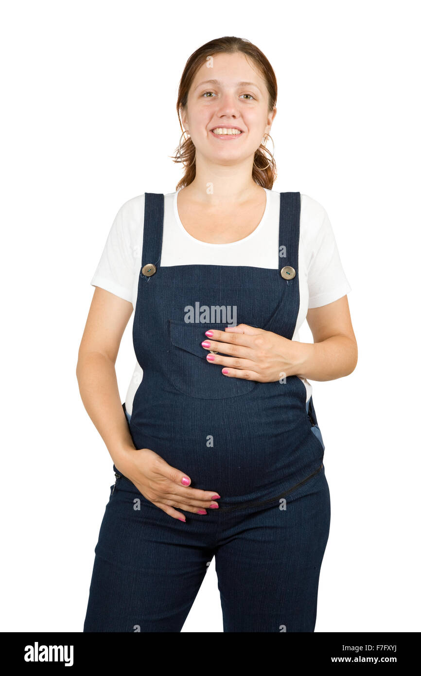 Porträt von 8 Monate schwangere Frau in weiß Stockfoto