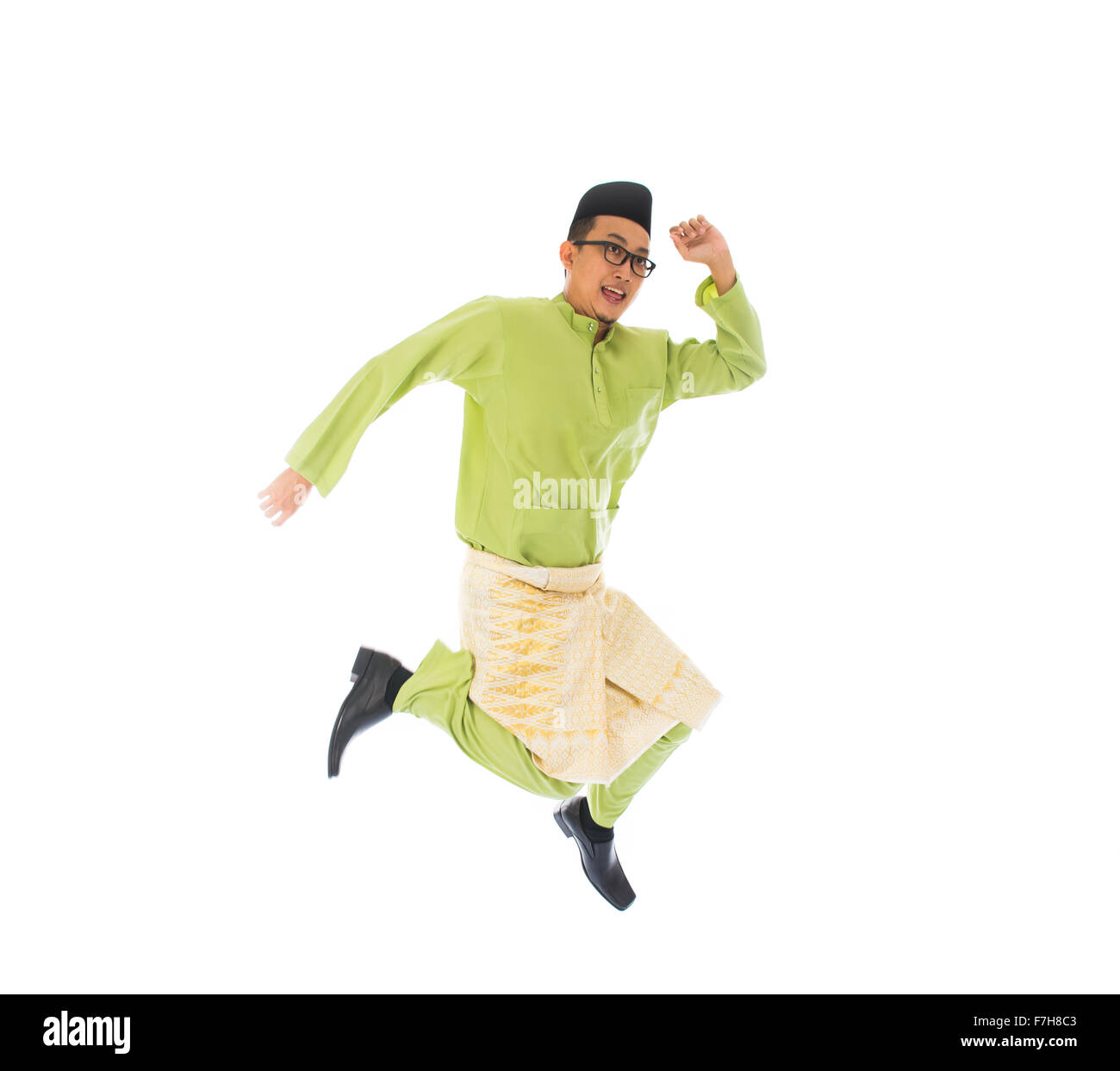 Malay männlichen springen in Freude Stockfoto