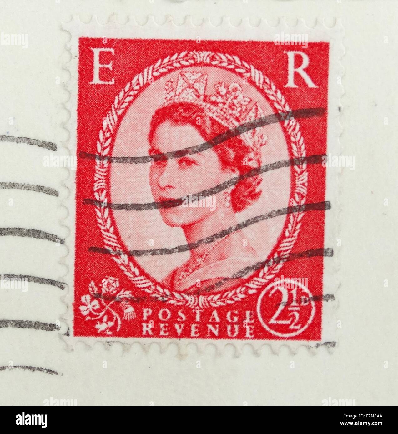 Königin Elizabeth II wie sie auf eine englische Briefmarke ca. 1958 erschienen. Stockfoto
