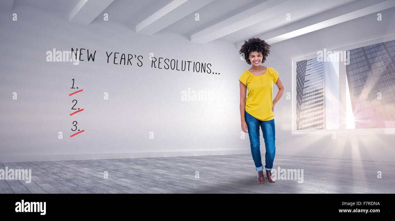 Zusammengesetztes Bild hübsche Hipster mit der Hand auf den Hüften in die Kamera Lächeln Stockfoto