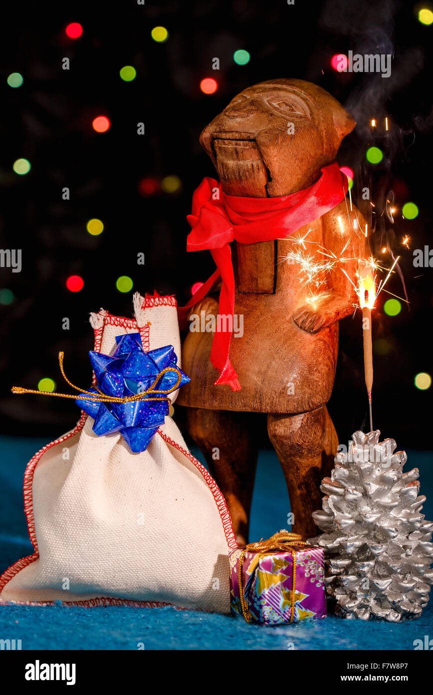 Weihnachtskarte mit Symbol des Jahres 2016 The Red Fire Monkey und Wunderkerze Stockfoto