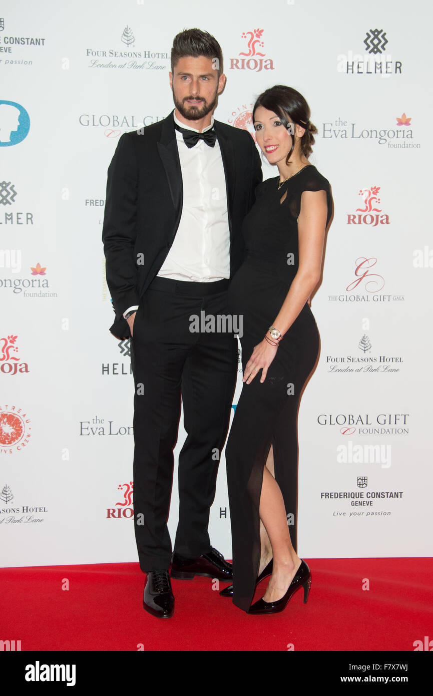 Olivier Giroud und Jennifer Giroud bei der globalen Gabe Gala 2015 in London Stockfoto